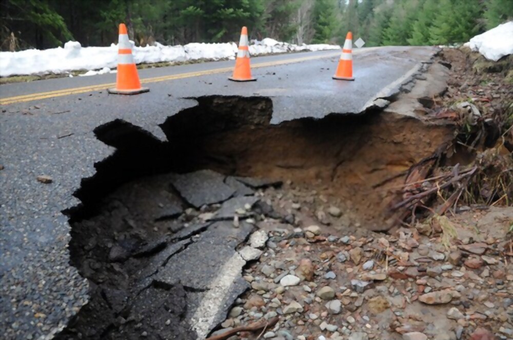 Sinkhole in Sidewalk