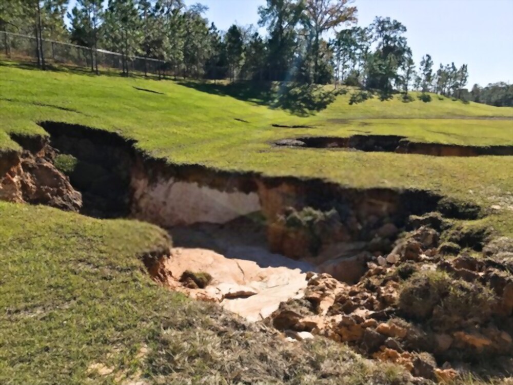 Sinkhole in Sidewalk